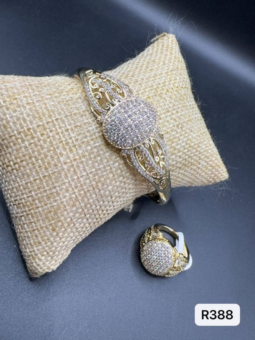 a rigid bracelet that can be opened and a ring (size 7)